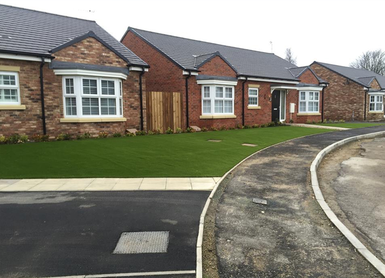 New build in Barnard Castle showing artificial grass installation