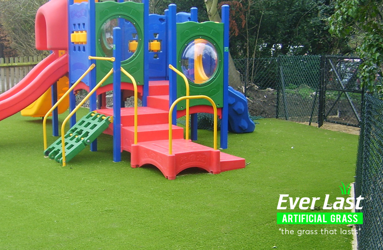 Children's play area showing artificial grass on floor
